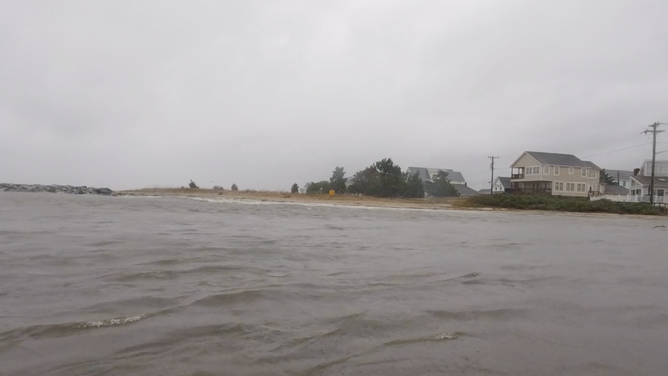 Flooding from high tide on Bowers Beach, Delaware on Oct. 12, 2025.